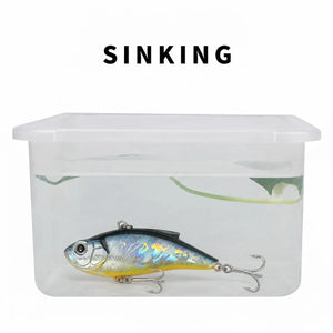 Water test showing a sinking lipless crankbait in a clear container.