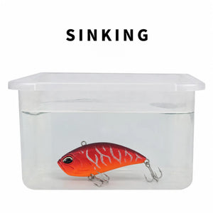 Water test showing a sinking lipless crankbait in a clear container.