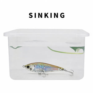 Water test showing a sinking pencil lure in a clear container.