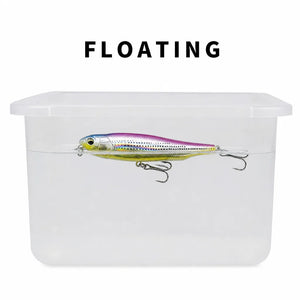Water test showing a floating pencil lure in a clear container.